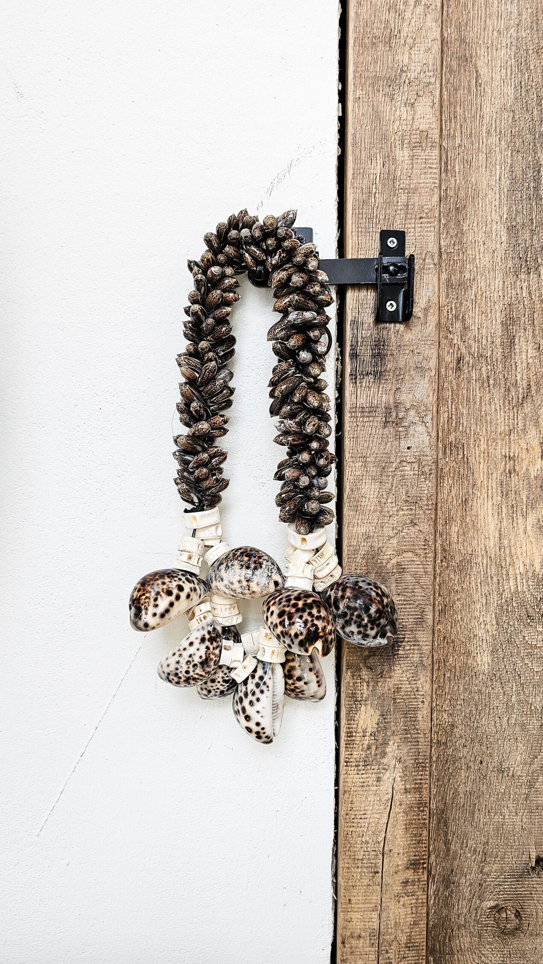 Wat zijn de decoratiemogelijkheden met een schelpenketting?