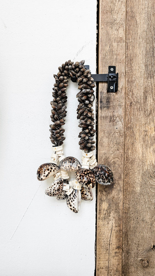 Wat zijn de decoratiemogelijkheden met een schelpenketting?