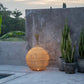 naturel gekleurde vloerlamp gemaakt  van rotan in wabi sabi interieur