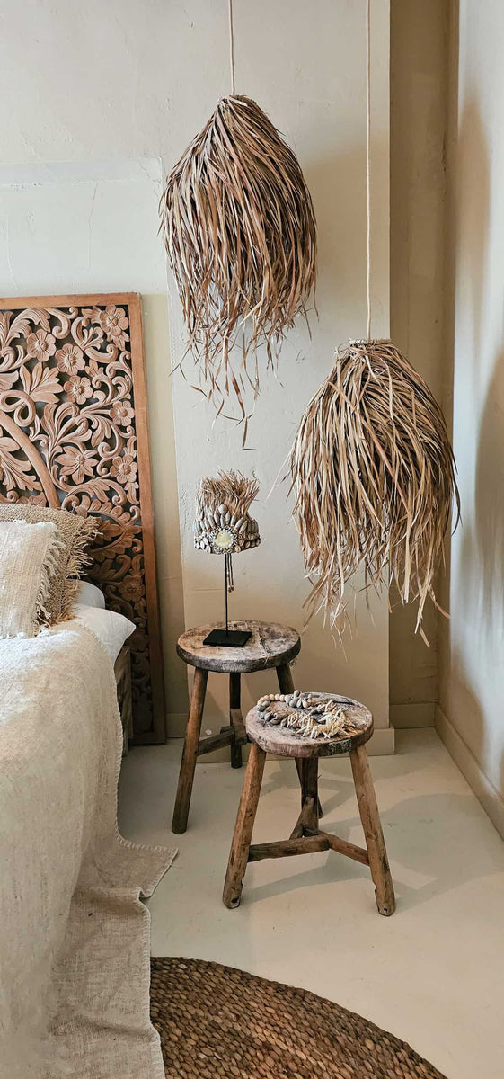 Uniek ornament van raffia en schelpen in bohemian interieur
