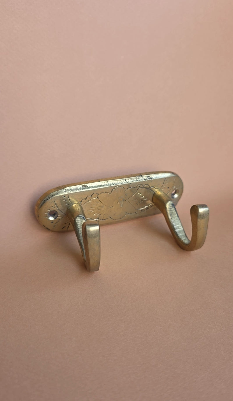 Goudkleurige wandhaak van messing