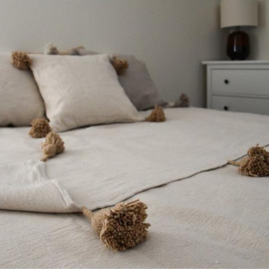 Pompondeken creme en beige